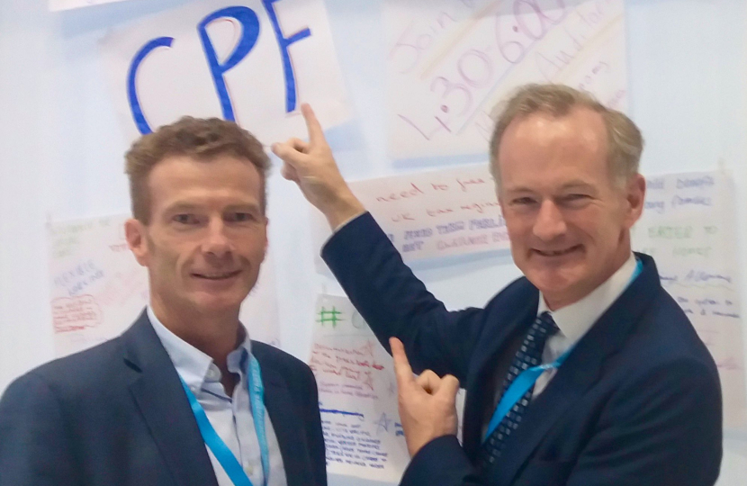 John Hayward and John Penrose at the CPF members' policy ideas wall