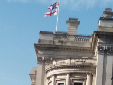 Flags flying from Her Majesty's Treasury