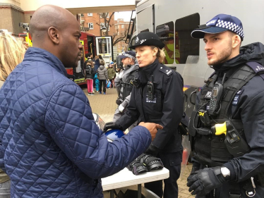 Shaun Bailey with police officers
